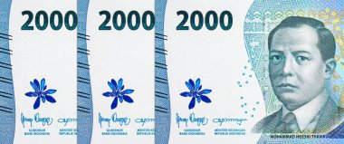 Muhammed Hüseyin Thamrin 'in portresiyle 2000 Rupiah Endonezya. Endonezya 'nın yeni parası