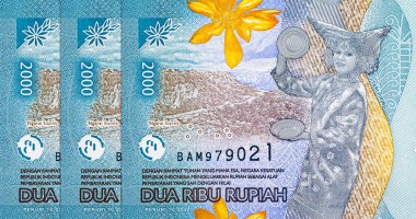 2000 Rupiah Endonezya ulusal dans partisi Tari Piring 'in portresi. Endonezya 'nın yeni parası