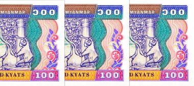 100 Kyats Myanmar, çalışan insanların ve geleneksel mimarinin görüntüleri. Myanmar 'ın Eski Kağıt Parası