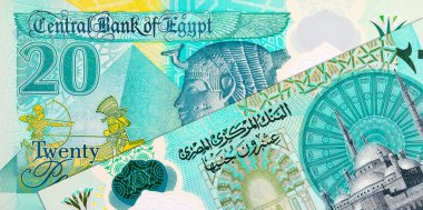 20 Pound Mısır 'da Kraliçe Kleopatra ve Büyük Piramitlerin portresi var. Mısır 'ın ulusal para birimi. Polimer para.