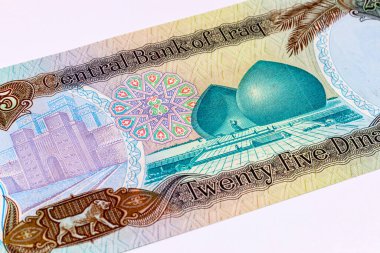 25 Dinar Irak, 1986 tarihli banknot Şehit Anıtı ve İştar Kapısı 'nın görüntüsüyle. Irak 'ın eski parası.