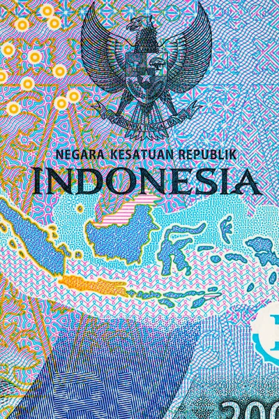 Tasarım için banknotun bir parçasıyla birlikte 2000 Rupiah Endonezya. Endonezya 'nın yeni parası.