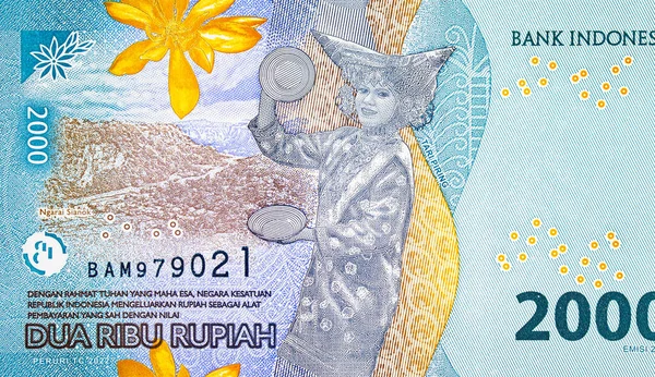 2000 Rupiah Endonezya ulusal dans partisi Tari Piring 'in portresi. Endonezya 'nın yeni parası