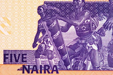 5 Naira Nijerya ve üç Yoruba davulcusunun portresi. Nijerya 'nın yeni polimer parası