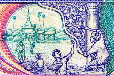 100 Kyats Myanmar, çalışan insanların ve geleneksel mimarinin görüntüleri. Myanmar 'ın Eski Kağıt Parası