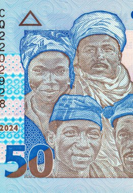 Nijerya 'nın 50 farklı insanının portresiyle 50 Naira Nijerya. Afrika halkı. Nijerya 'nın yeni polimer parası.