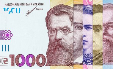 Ünlü insanların portre parçalarıyla Ukrayna parası. Ukrayna para birimi Hryvnia.