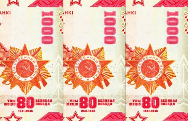 Kazakistan 'daki Zafer Günü Banknote 1000, Kazakistan, 2025, Kazakistan haritası ve Vatanseverlik Savaşı Düzeni. Kazakistan 'ın yeni parası