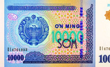 Ulusal amblemin resmedildiği 10000 Özbekistan. Özbekistan 'ın kağıt parası