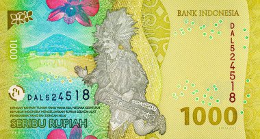1000 Rupiah Endonezya 'da Tari Tifa dansı resmi ve geleneksel Endonezya' nın kağıt parası..