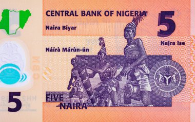 5 Naira Nijerya ve üç Yoruba davulcusunun portresi. Nijerya 'nın yeni polimer parası