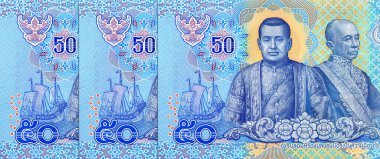 Kral III. Rama ve Kral IV. Rama 'nın yer aldığı 50 Baht Tayland Polimer Banknotunun tersi. Tayland 'ın yeni polimer parası.