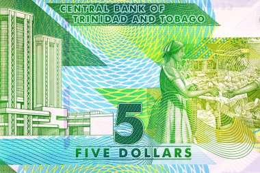 5 Dolar Trinidad ve Tobago polimer banknotları İspanya Limanı 'ndaki Eric Williams Finansal Kompleksi' nde. Trinidad ve Tobago Plastik Para