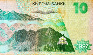 Kırgızistan 'ın ters tarafındaki 10 Som banknotunda dağlar ve geleneksel süsler var. Asya 'nın parası. Kırgızistan Para Birimi.