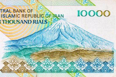 İran 'ın 10000 Rial banknotunun ters tarafında Damavand Dağı var. İran İslam Cumhuriyeti 'nin parası. Asya para birimi.