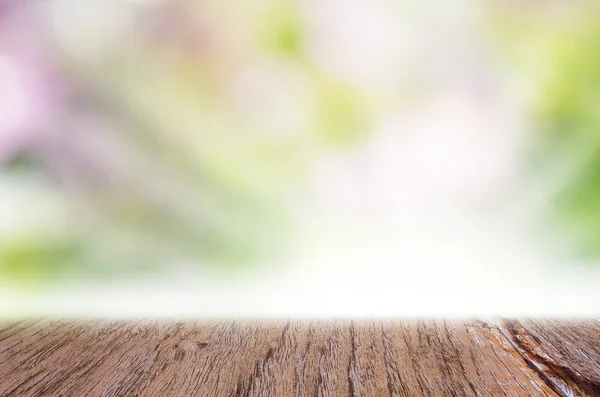 Mesa de plataforma de madeira com bokeh — Fotografia de Stock