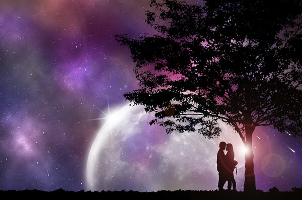 Silhouette Couple and tree, with beautiful night sky, Concept looking out to the outside world.