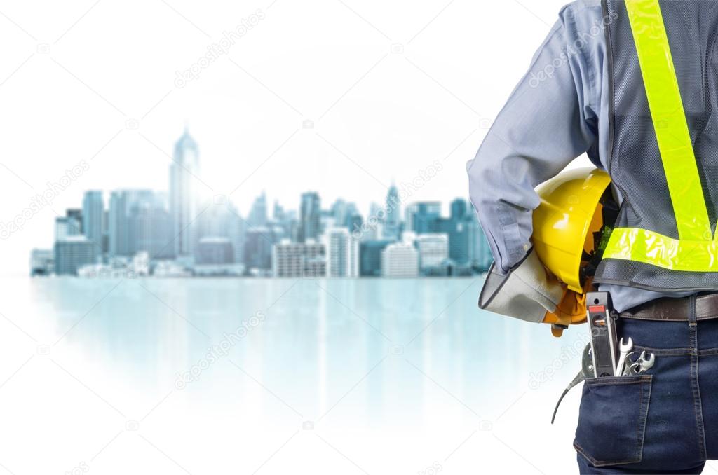 Engineer wearing yellow helmet