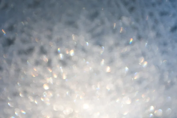 Abstract defocused background of icy blue winter lights — Stock Photo, Image