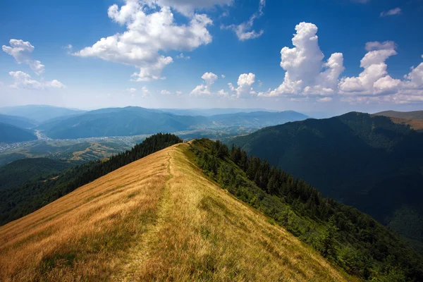 Mountain trail on top of the hills on sky background — Stock Photo, Image