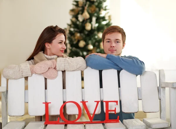 Dreamy young couple in love in the studio at home — Stock Photo, Image