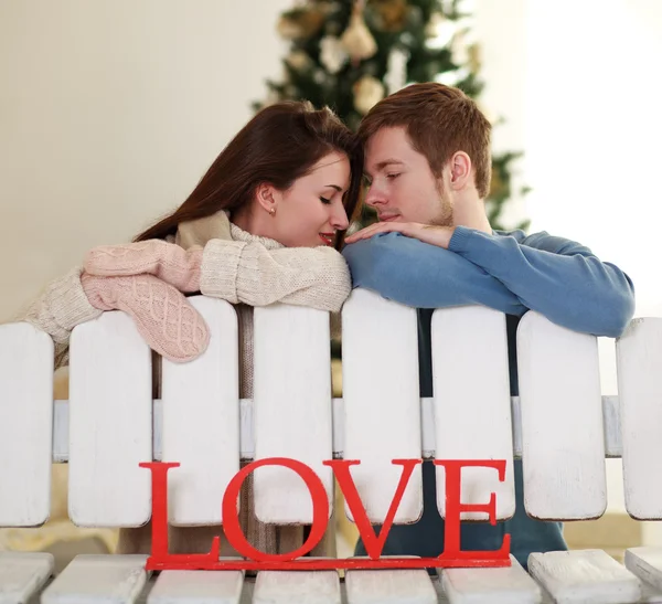 Dreamy young couple in love in the studio at home — Stock Photo, Image