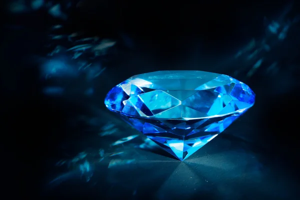 Shiny blue Diamond on a black background — Stock Photo, Image