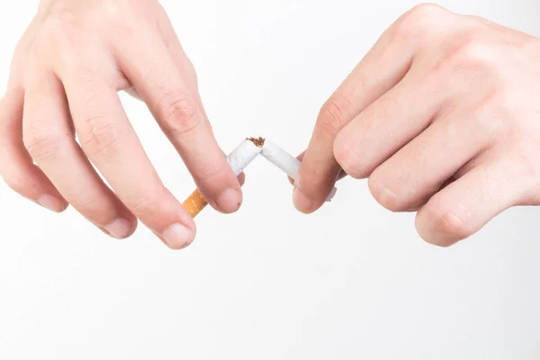 Χέρι Κρατήστε Τσιγάρο Καταστρέψει Απομονώνονται Λευκό Φόντο — Φωτογραφία Αρχείου