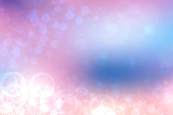 A festive abstract orange pink blue gradient background texture with glitter defocused sparkle bokeh circles. Card concept for Happy New Year, party invitation, valentine or other holidays.
