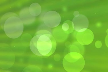 Abstract bright spring or summer landscape texture with natural green bokeh lights and bright circular lights with sunshine and sun rays. Beautiful autumn background with copy space.