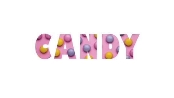 Palabra de caramelo hecha de coloridos caramelos multicolores sobre un fondo rosa. — Vídeos de Stock
