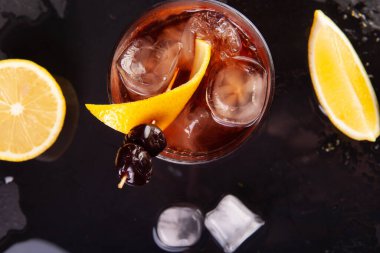 beautifully decorated alcoholic cocktail in studio on black background