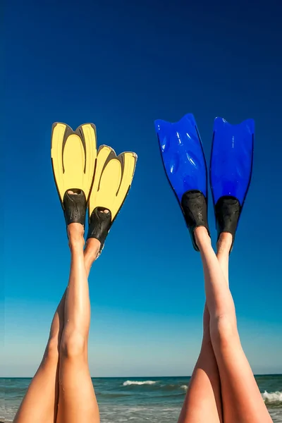 Female Legs Shod Flippers Raised Summer Stock Photo