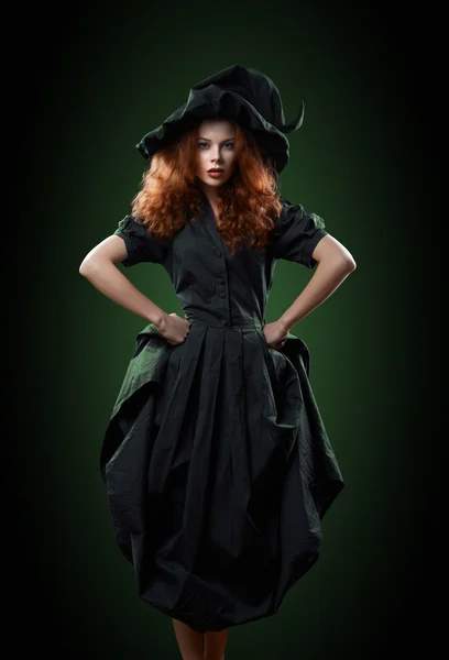 Beautiful red-haired girl in  costumes witch — Stock Photo, Image