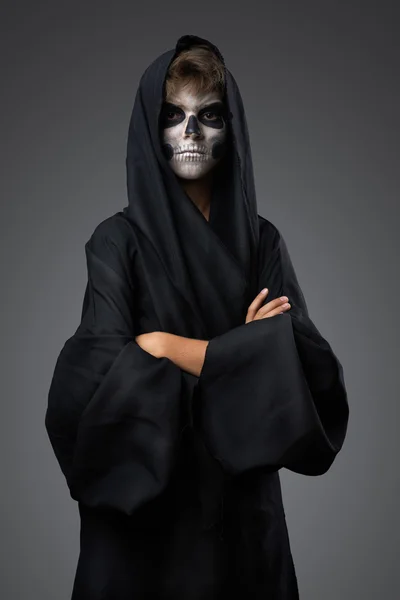 Teenager with makeup skull cape — Stock Photo, Image