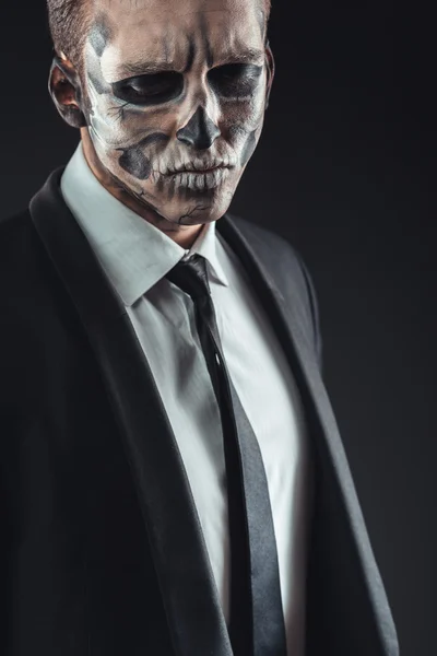 Closeup portrait businessman with makeup skeleton — Stock Photo, Image