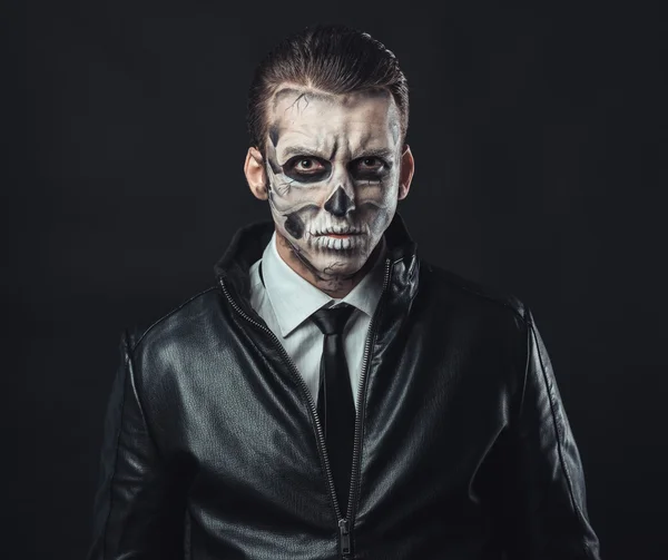 Portrait of pensive man with make-up  skull — Stock Photo, Image