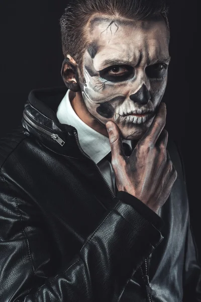 Portrait of pensive man with make-up  skull — Stock Photo, Image
