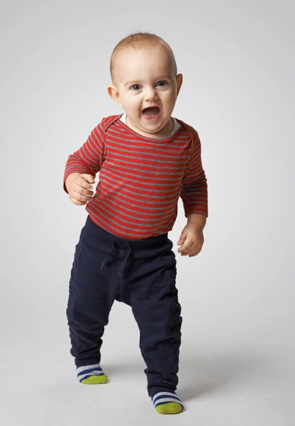 Cheerful  boy goes forward — Stock Photo, Image