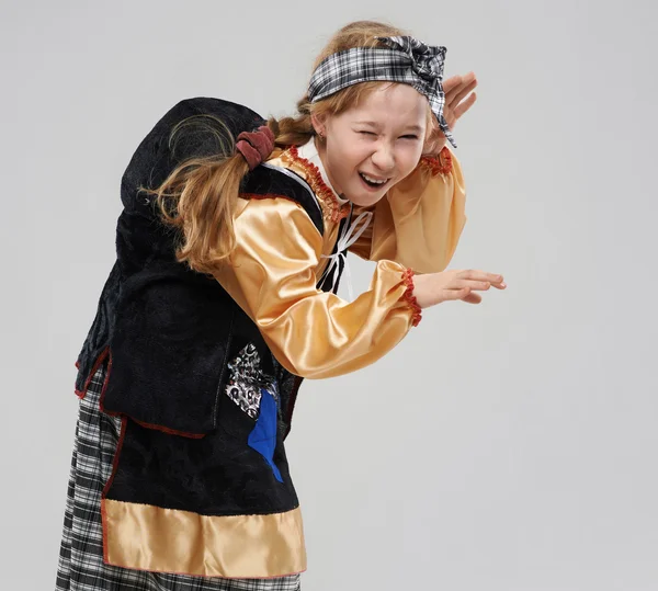 Redhead girl in witch costume scares — Stock Photo, Image