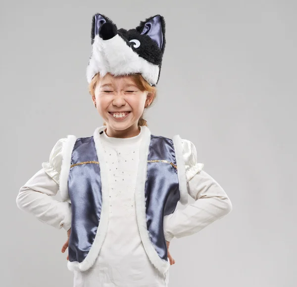 Red-haired girl in a suit of wolf laughs — Stock Photo, Image