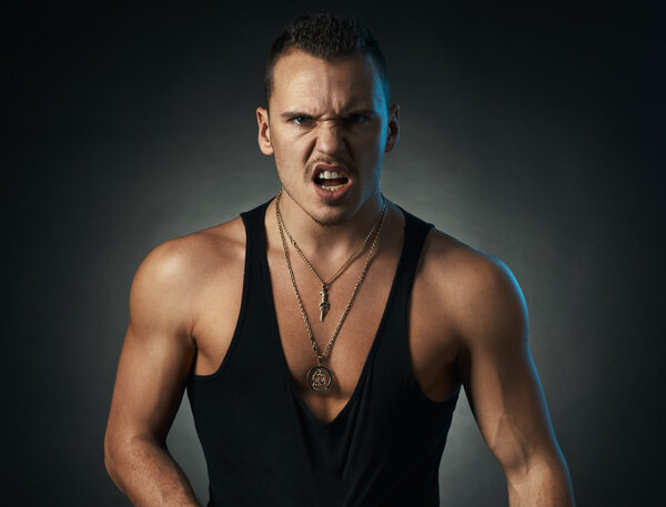 furious man on  black background