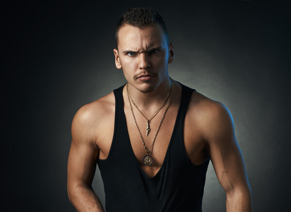  suspicious man on a black background