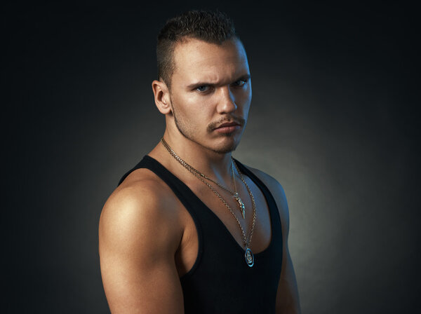 serious sports man on  black background