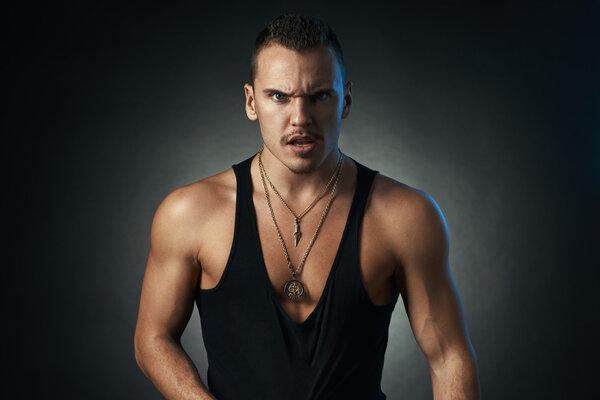 angry man on black background