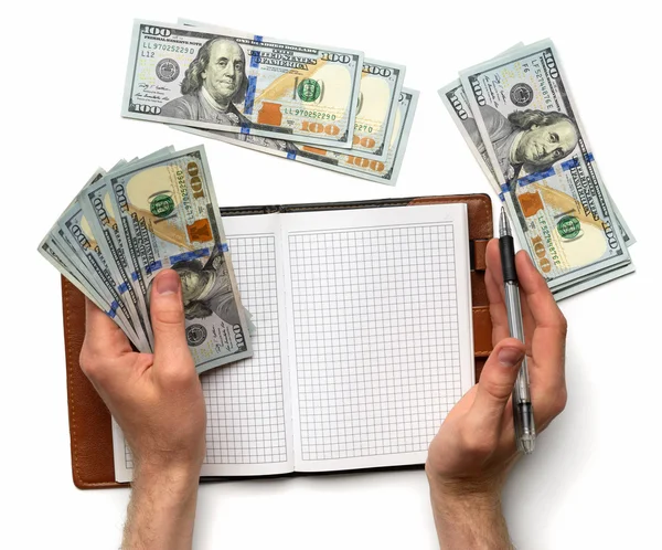 Registrar los gastos en el cuaderno —  Fotos de Stock