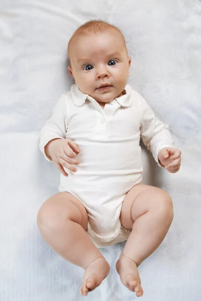 Surprised baby  on diaper — Stock Photo, Image