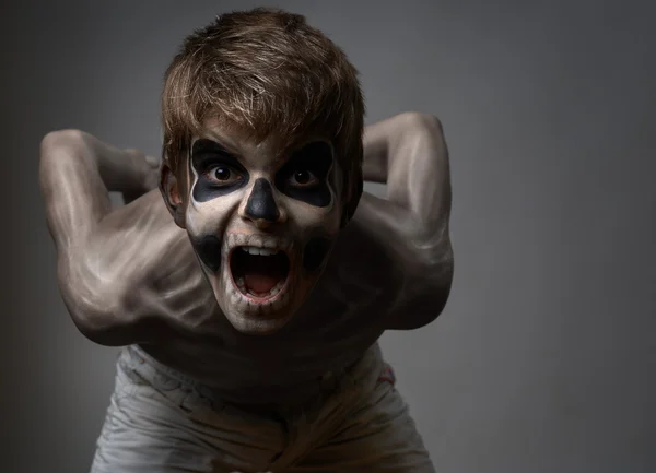 Angry teenager with makeup skull cape — Stock Photo, Image