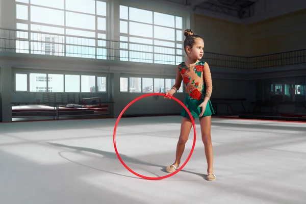 Girl gymnast with  hoop looking away — Stock Photo, Image