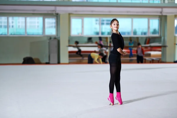 Girl dancing on training  rhythmic gymnastics — Stock Photo, Image